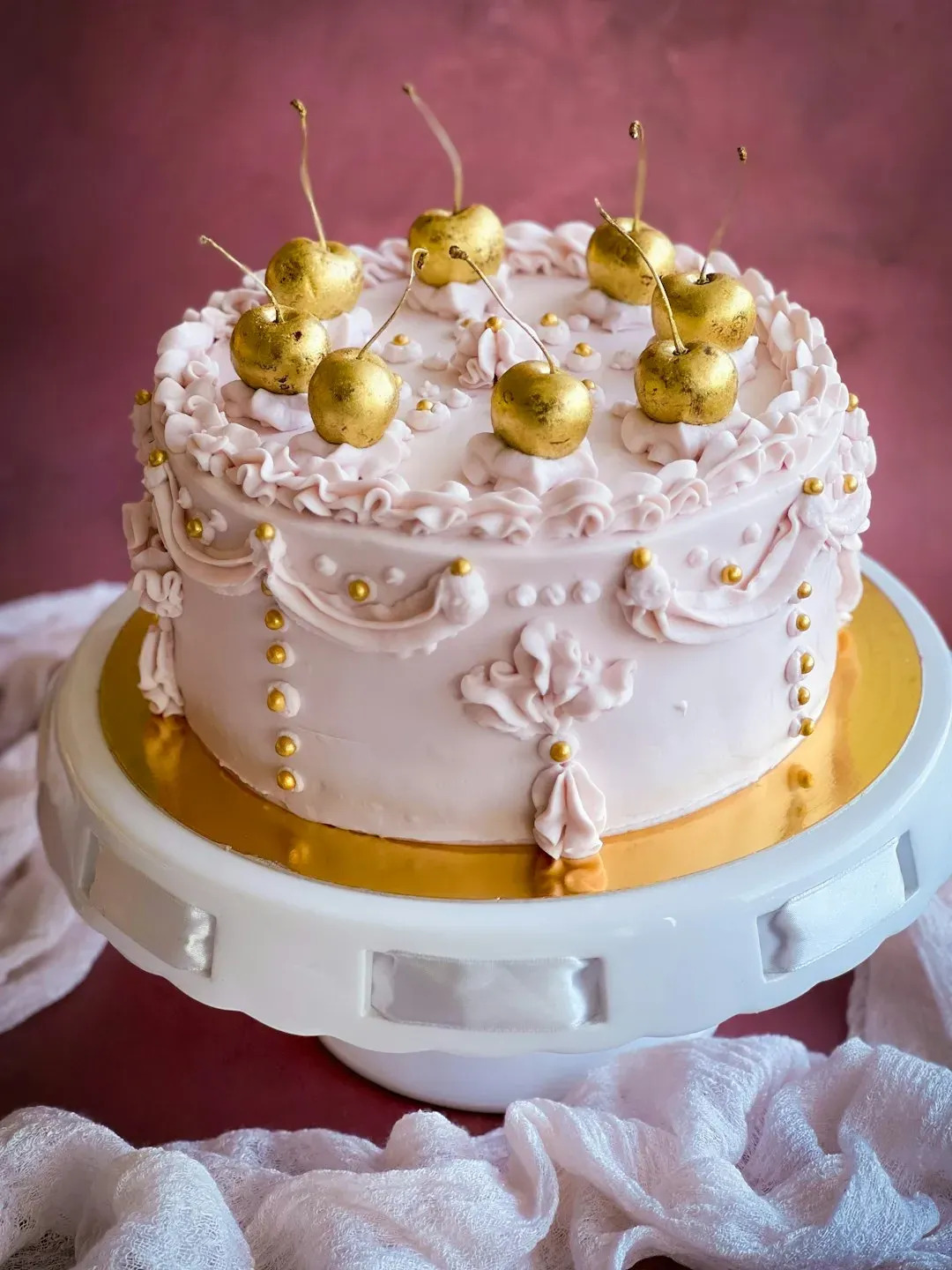 Leo: Showstopping Gold-Dusted Champagne Cake (Image Credits: Unsplash)