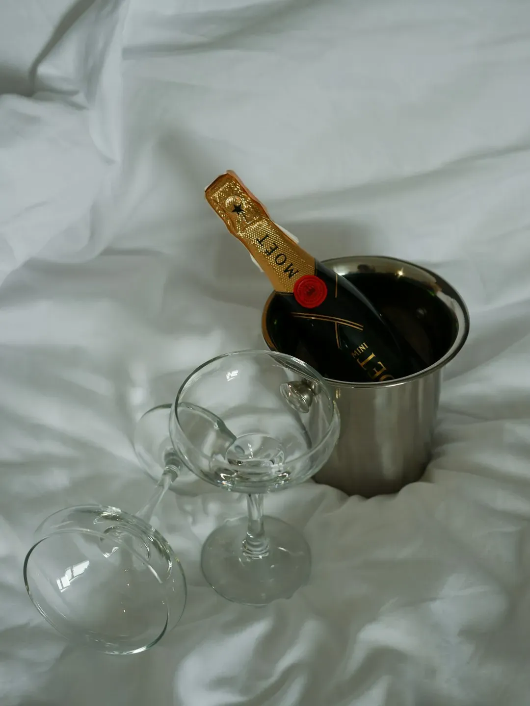 3. Getting Visibly Excited About the Champagne - Then Demanding a Brand Name (Image Credits: Unsplash)