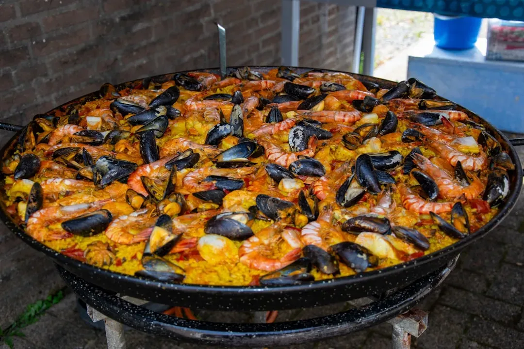 Spanish Paella: The Golden Rice Feast (Image Credits: Unsplash)