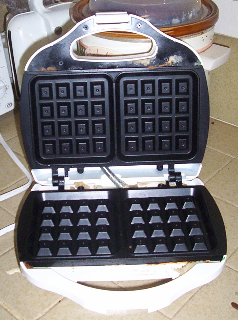 Cooking the Waffles (image credits: wikimedia)