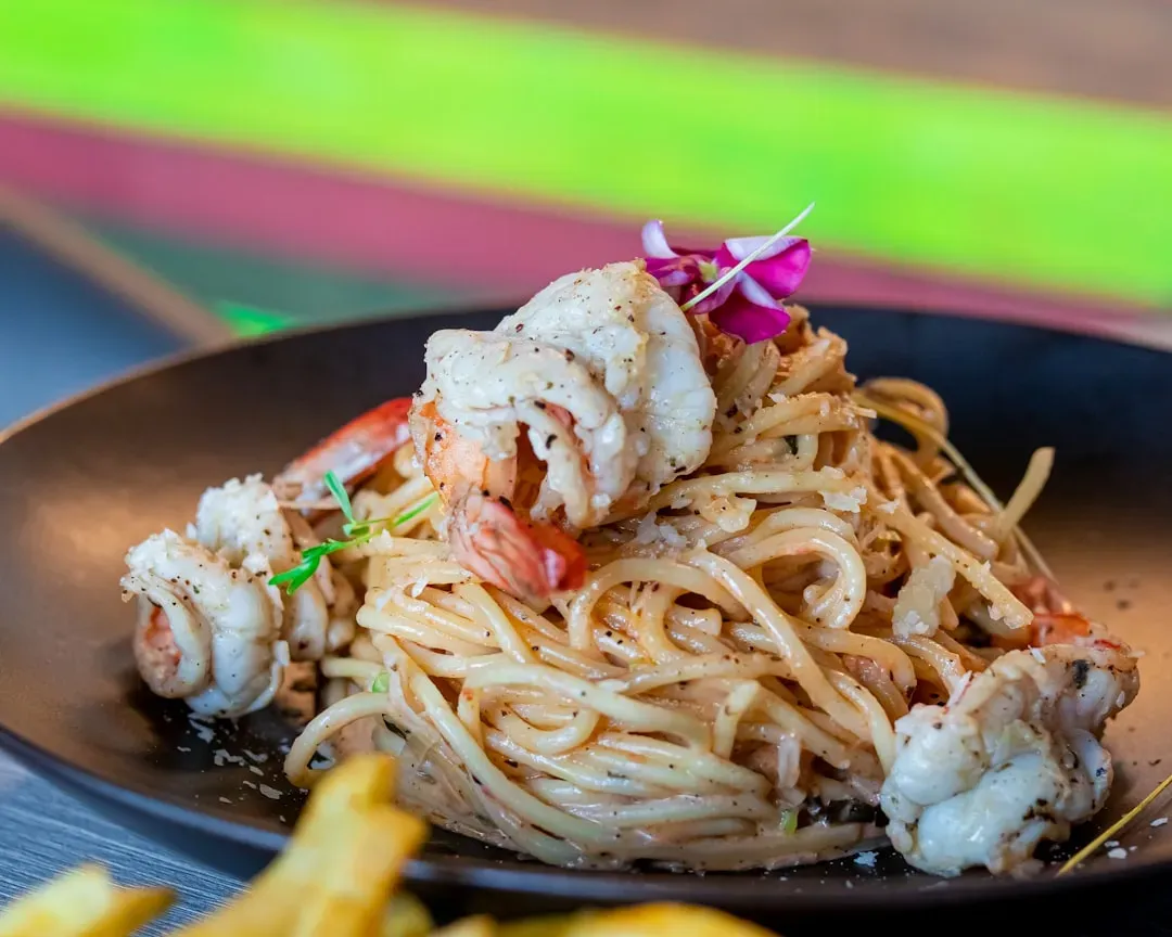 2. Restaurant Pasta: Cheap Noodles With a Luxury Price Tag (Image Credits: Unsplash)