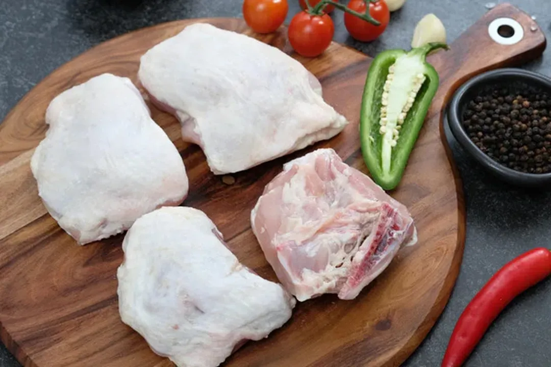 Ingredient #3: Chicken Thighs - Flavor Without the Price Tag (Image Credits: Unsplash)