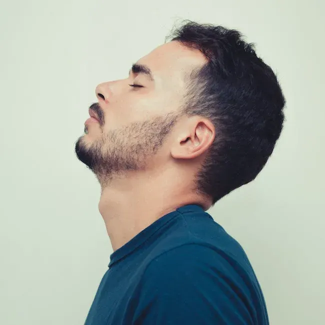 Habit 1: The Chin Tuck (Cervical Retraction) (Image Credits: Pexels)