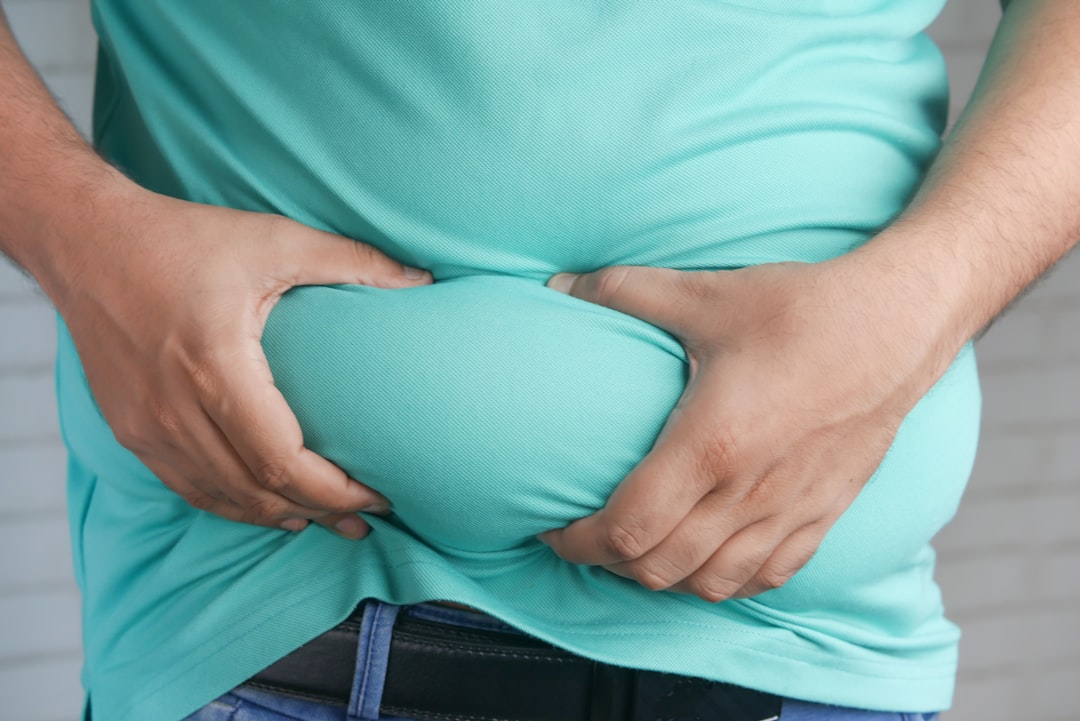 Your Clothes Are Getting Tighter Around the Middle (image credits: unsplash)