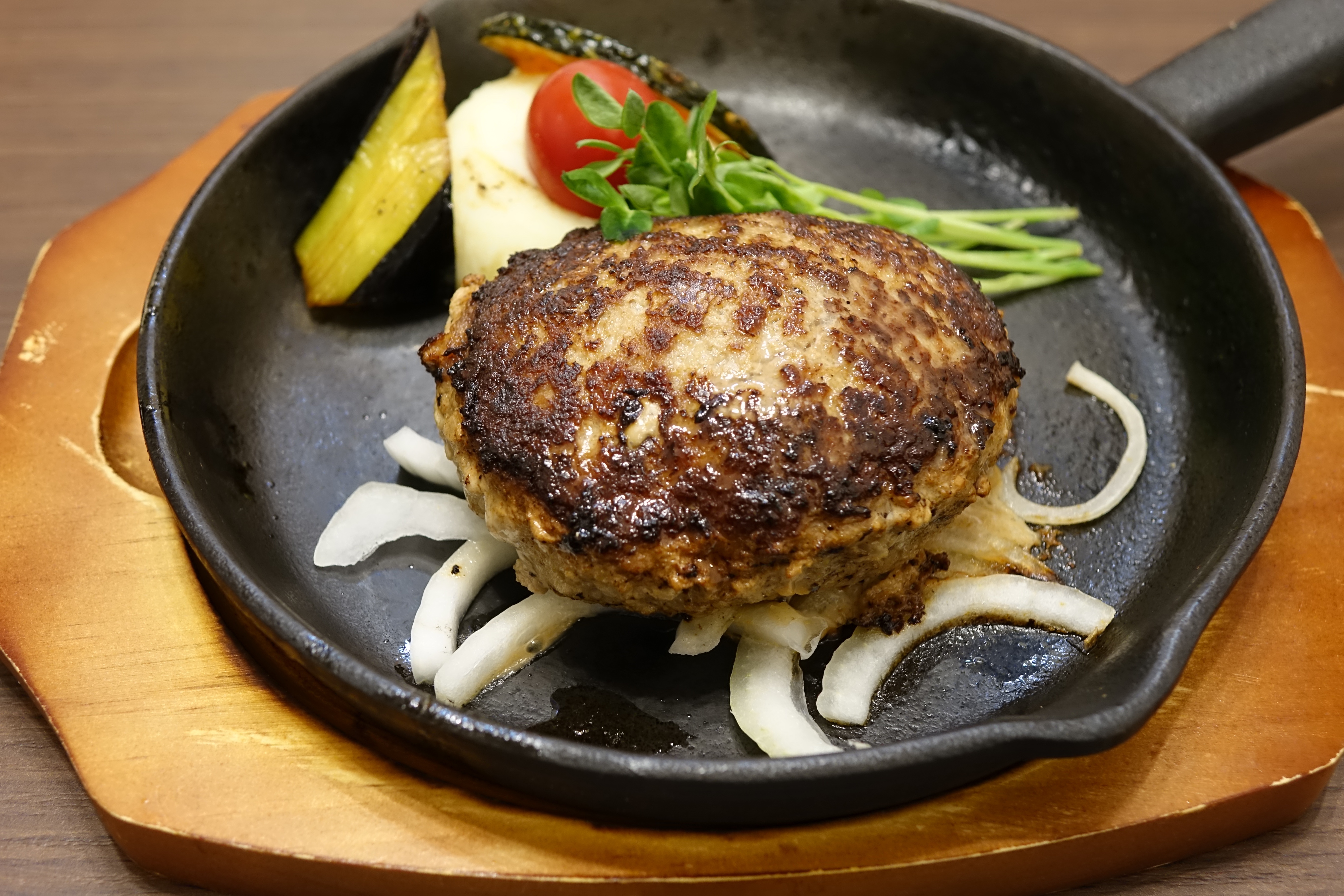 International Interpretations (image credits: Hamburg steak, CC BY-SA 2.0, https://commons.wikimedia.org/w/index.php?curid=77828069)