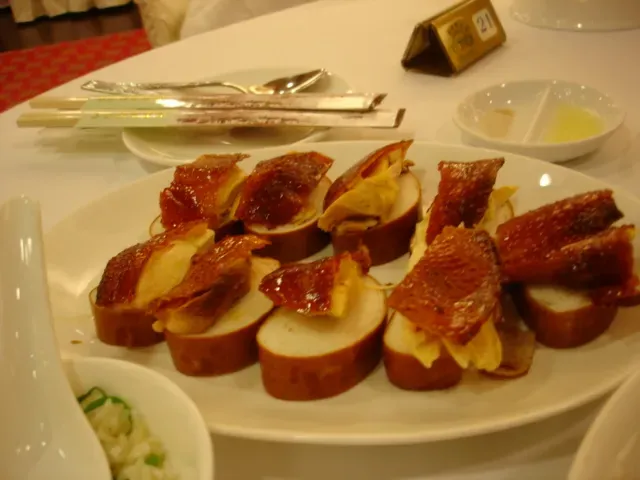6. Peking Duck - Beijing's Most Celebrated Dish (peking duck on a baguette, CC BY 2.0)