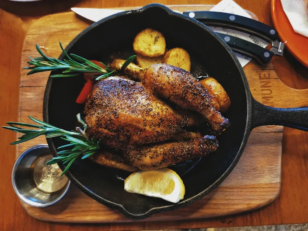 A Perfectly Roasted Chicken (Image Credits: Unsplash)