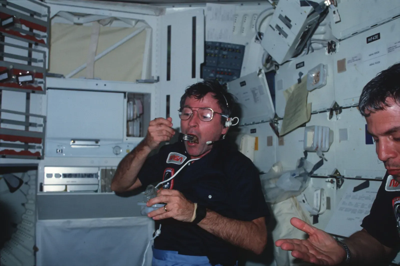 The Psychology of Eating in Space (By STS-9 crew, Public domain)