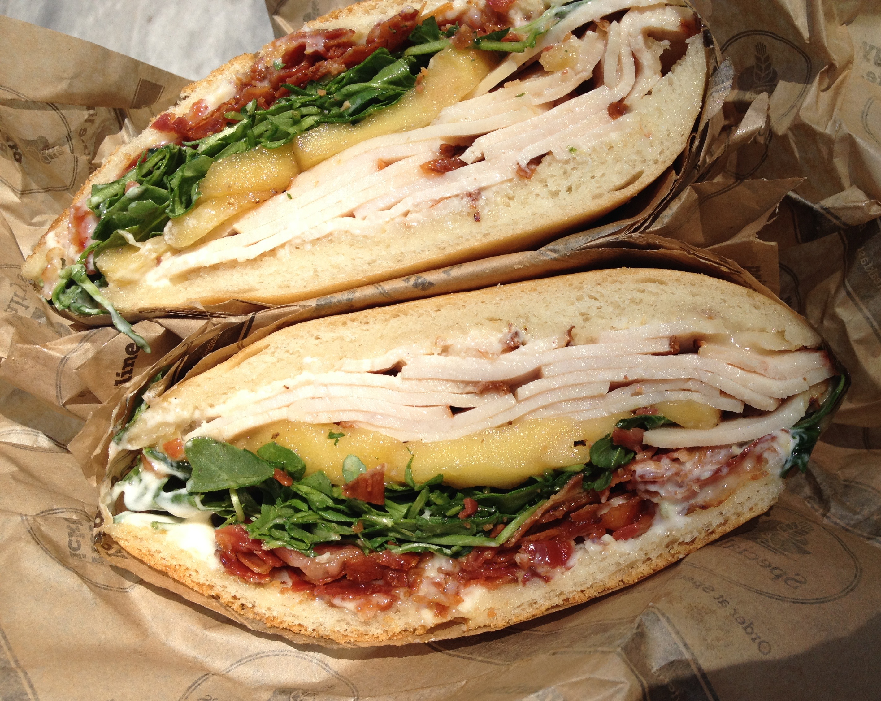 Panera Bread: Half Turkey Sandwich + Apple (image credits: wikimedia)