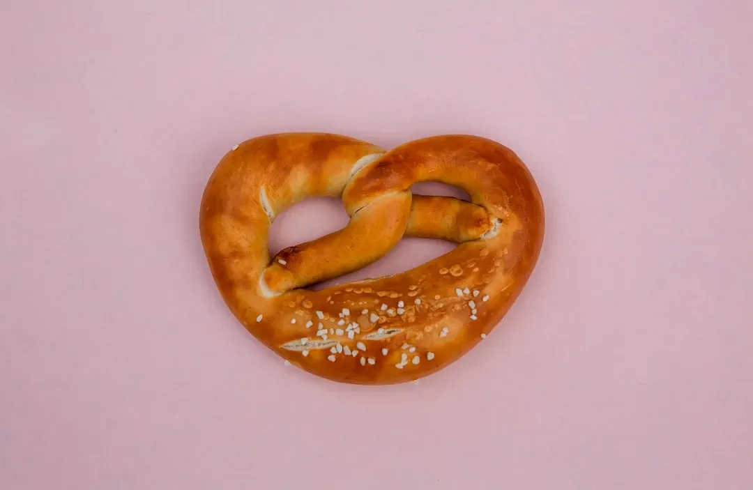 Soft Pretzel with Cheese Sauce (Image Credits: Unsplash)