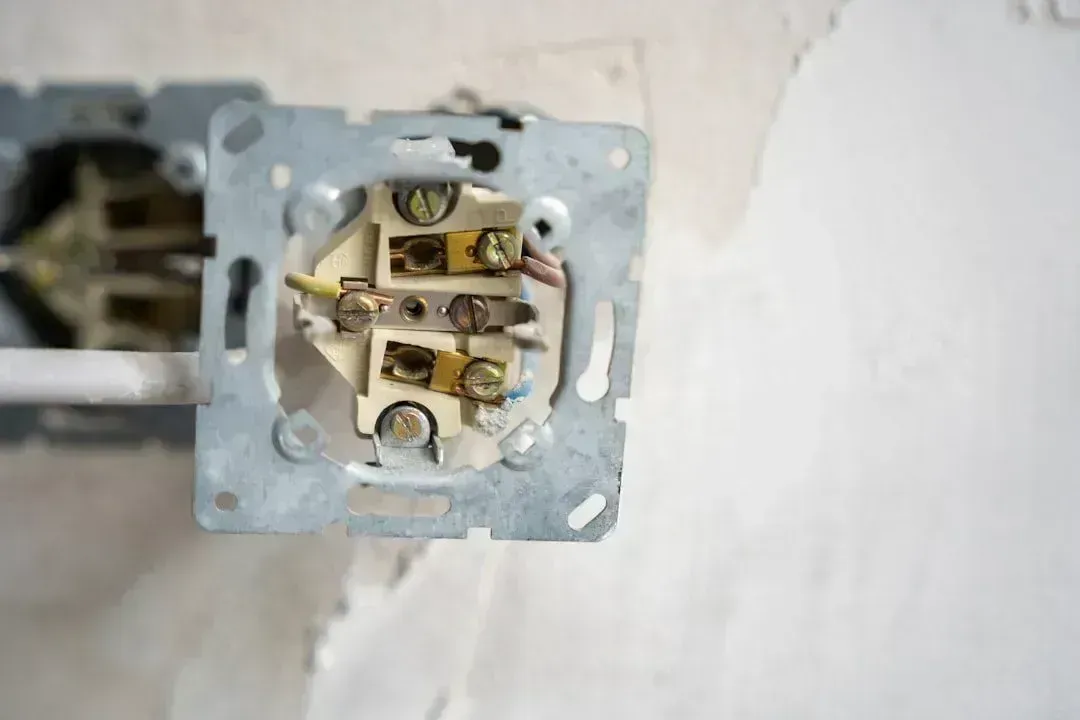 DIY Electrical Work Without Proper Licensing (Image Credits: Unsplash)