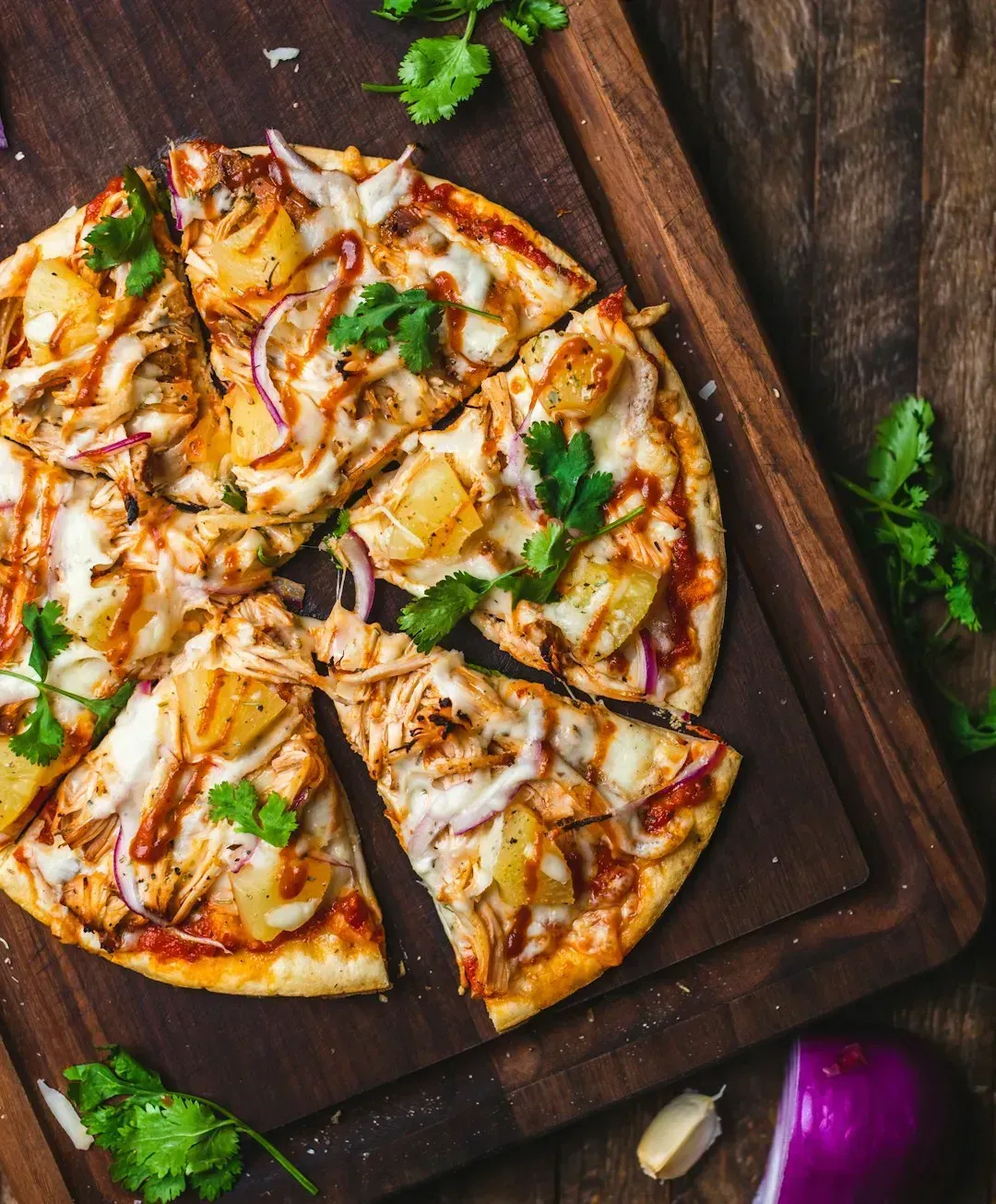 7. California Pizza Kitchen BBQ Chicken: Creative but Too Far from the Classics (Image Credits: Unsplash)