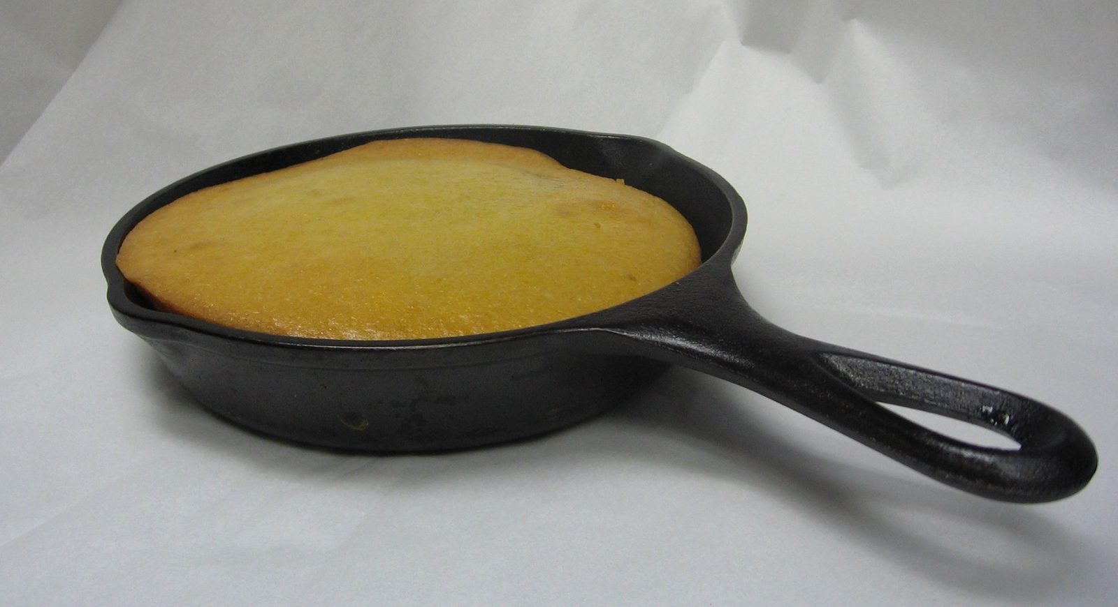 Crackling Cornbread: The Crispy Revolution (Image Credits: Transferred from en.wikipedia to Commons by Kelly using CommonsHelper., Attribution, https://commons.wikimedia.org/w/index.php?curid=16022423)