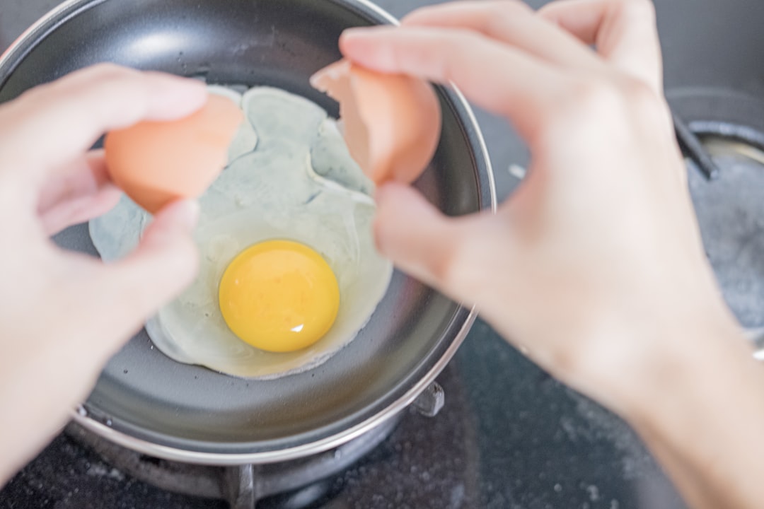 Cracking Eggs Directly into the Hot Pan (image credits: unsplash)