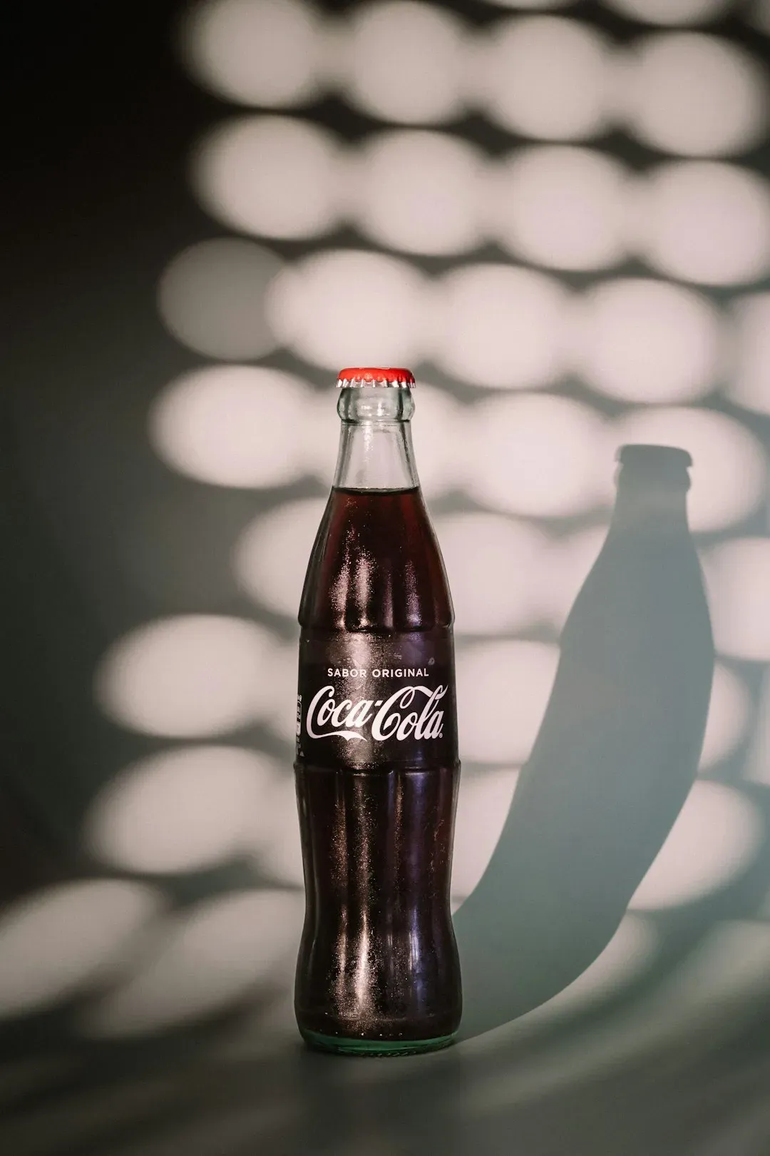 1. Coca-Cola Hutchinson Bottles (1890s to Early 1900s) (Image Credits: Unsplash)