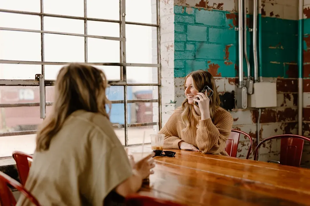 6. You Show Up Glued to Your Phone Mid-Order (Image Credits: Unsplash)