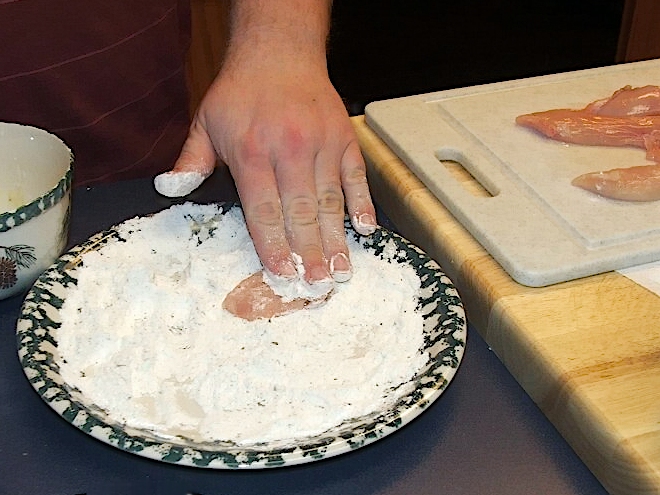 Improper Hand Technique During Breading (image credits: This file was derived from: Standard Breading Procedure - Chicken Fingers 3.jpg:, CC BY 2.0, https://commons.wikimedia.org/w/index.php?curid=18599398)