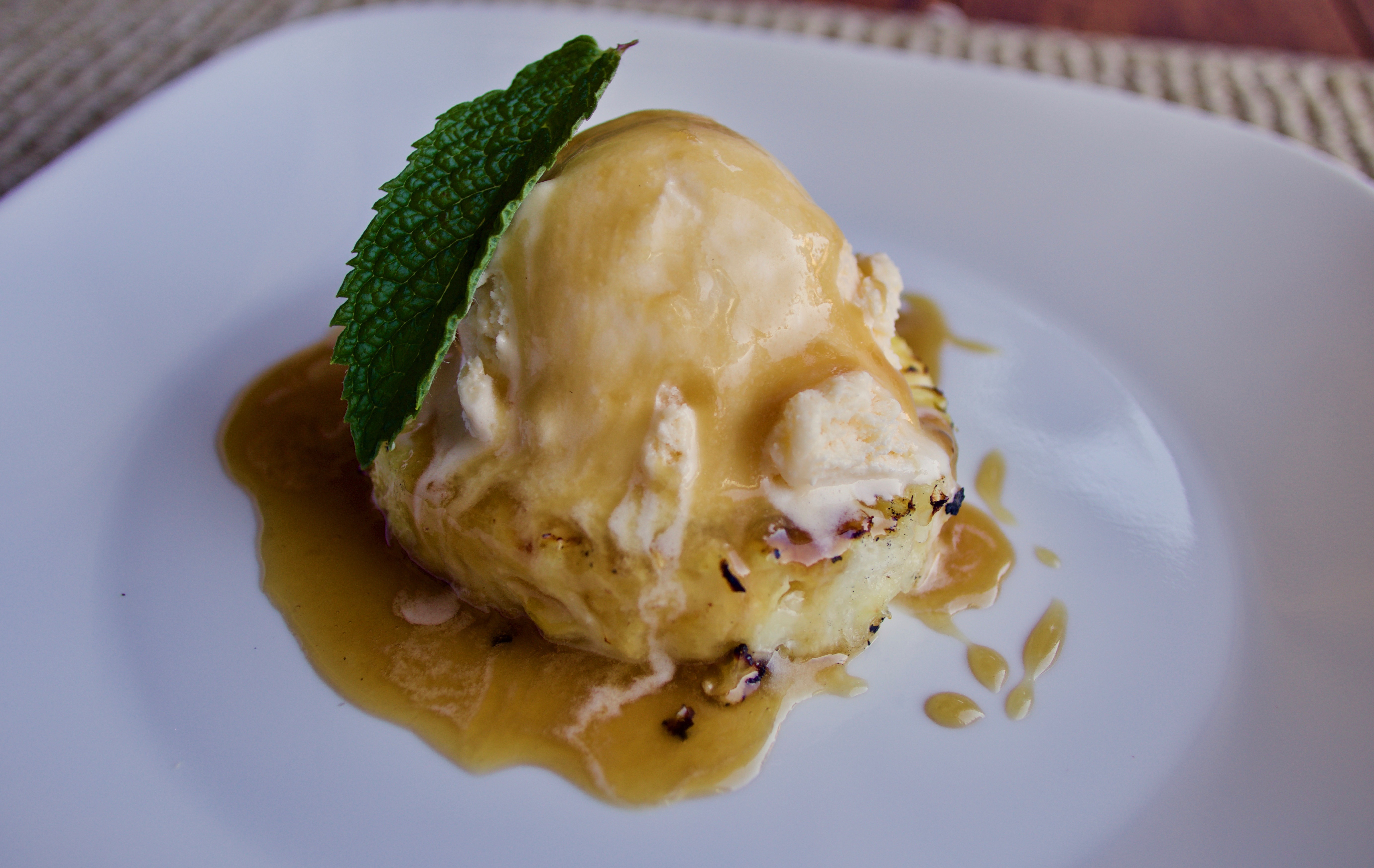 Frozen Custard - Wisconsin's Dairy Crown Jewel (Image Credits: Grilled Pineapple with Rum Sauce and Frozen Vanilla Yogurt, CC BY-SA 2.0, https://commons.wikimedia.org/w/index.php?curid=82990192)
