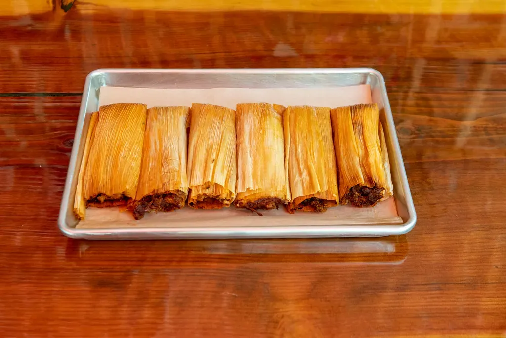 Tamales: Ancient Food, Timeless Tradition (Jose Nicdao, Flickr, CC BY 2.0)