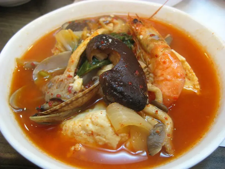 Making the Final Decision at the Table (Image Credits: Flickr)