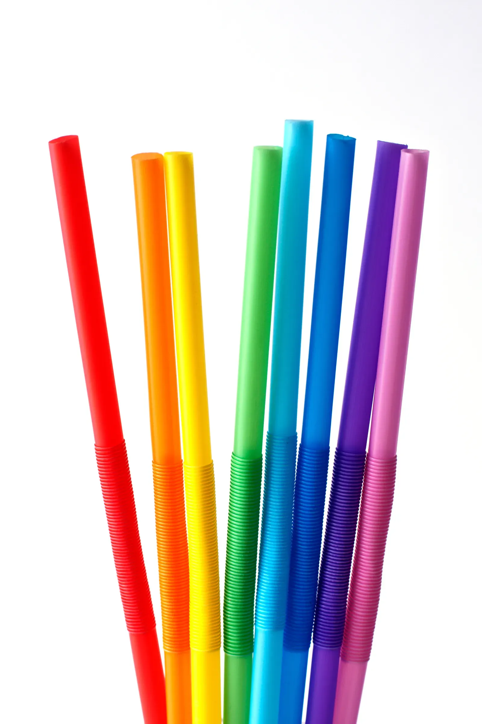 3. Plastic "Eco" Straws Marketed as BPA-Free: A Label That Misleads (Eight drinking straws in rainbow colors, CC BY 2.0)
