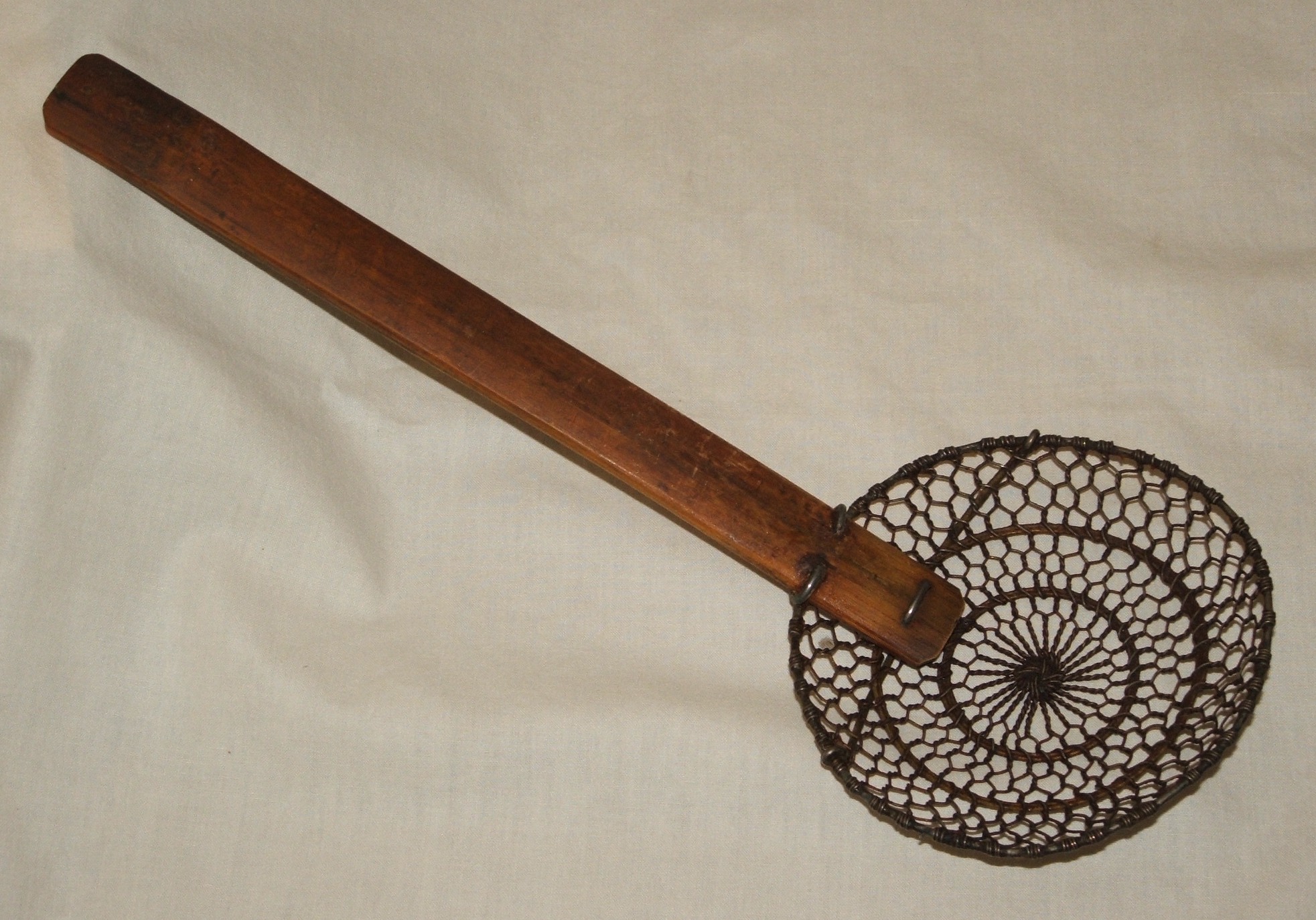 The Spider Skimmer: Asia's Gift to Global Kitchens (Image Credits: Wikimedia)