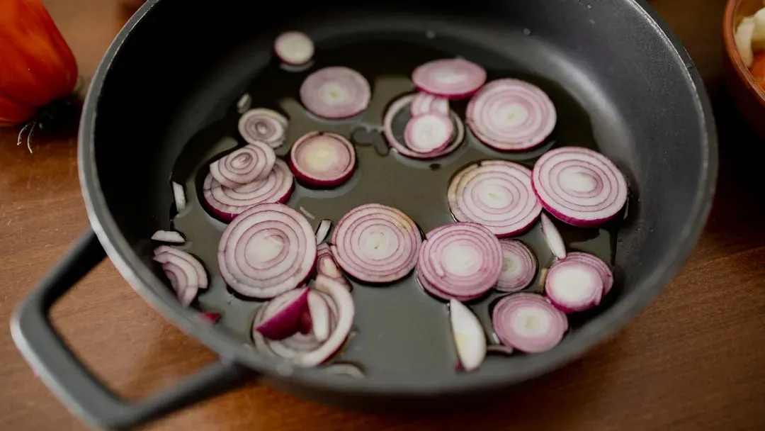7. Onions: The Flavor Foundation That Costs Almost Nothing (Image Credits: Unsplash)