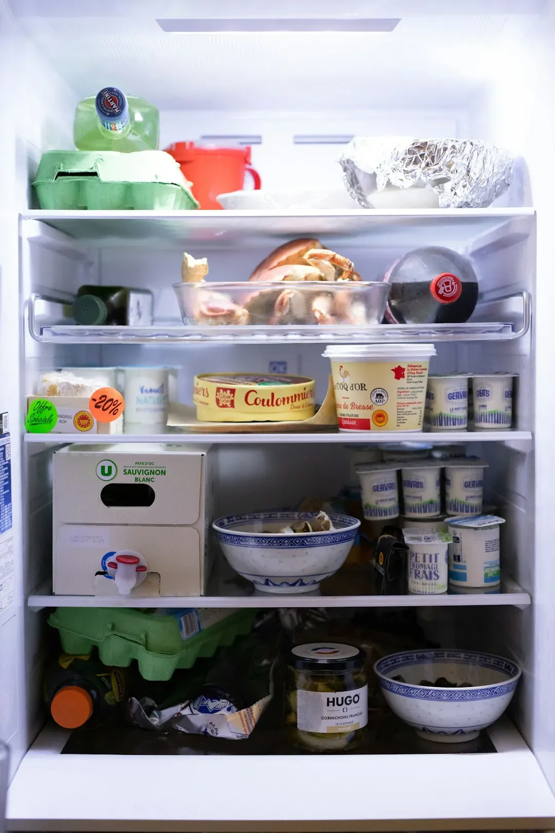 1. A Cluttered, Overstuffed Fridge May Signal Elevated Stress Levels (Image Credits: Unsplash)