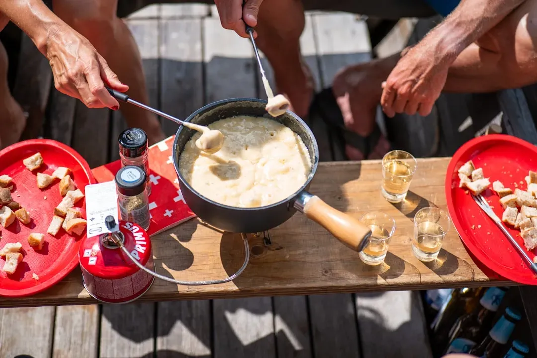 7. Fondue Night: Communal, Cheesy, and Relentlessly Retro (Image Credits: Unsplash)