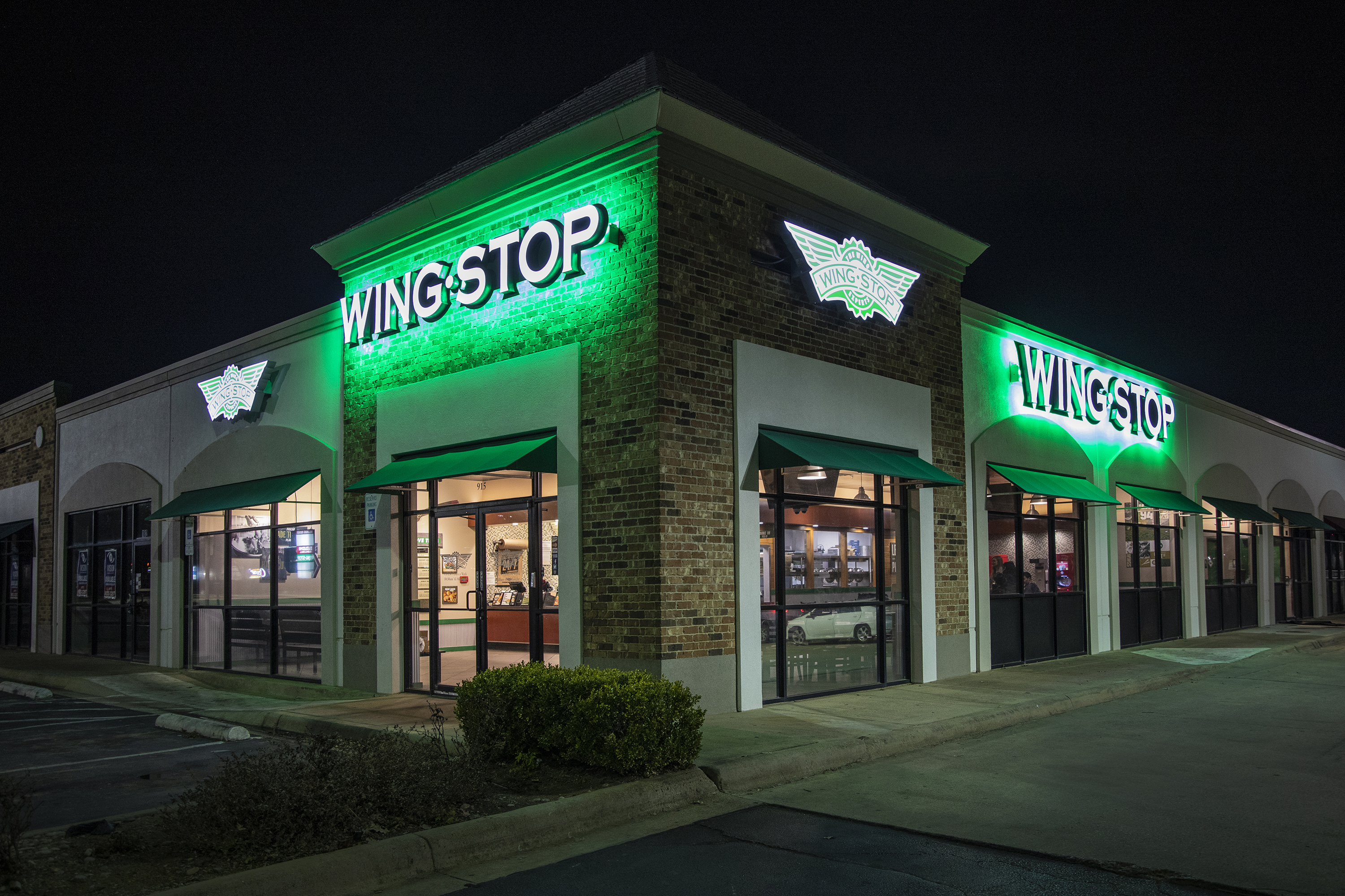 Wingstop Riding the Wing Wave (image credits: wikimedia)