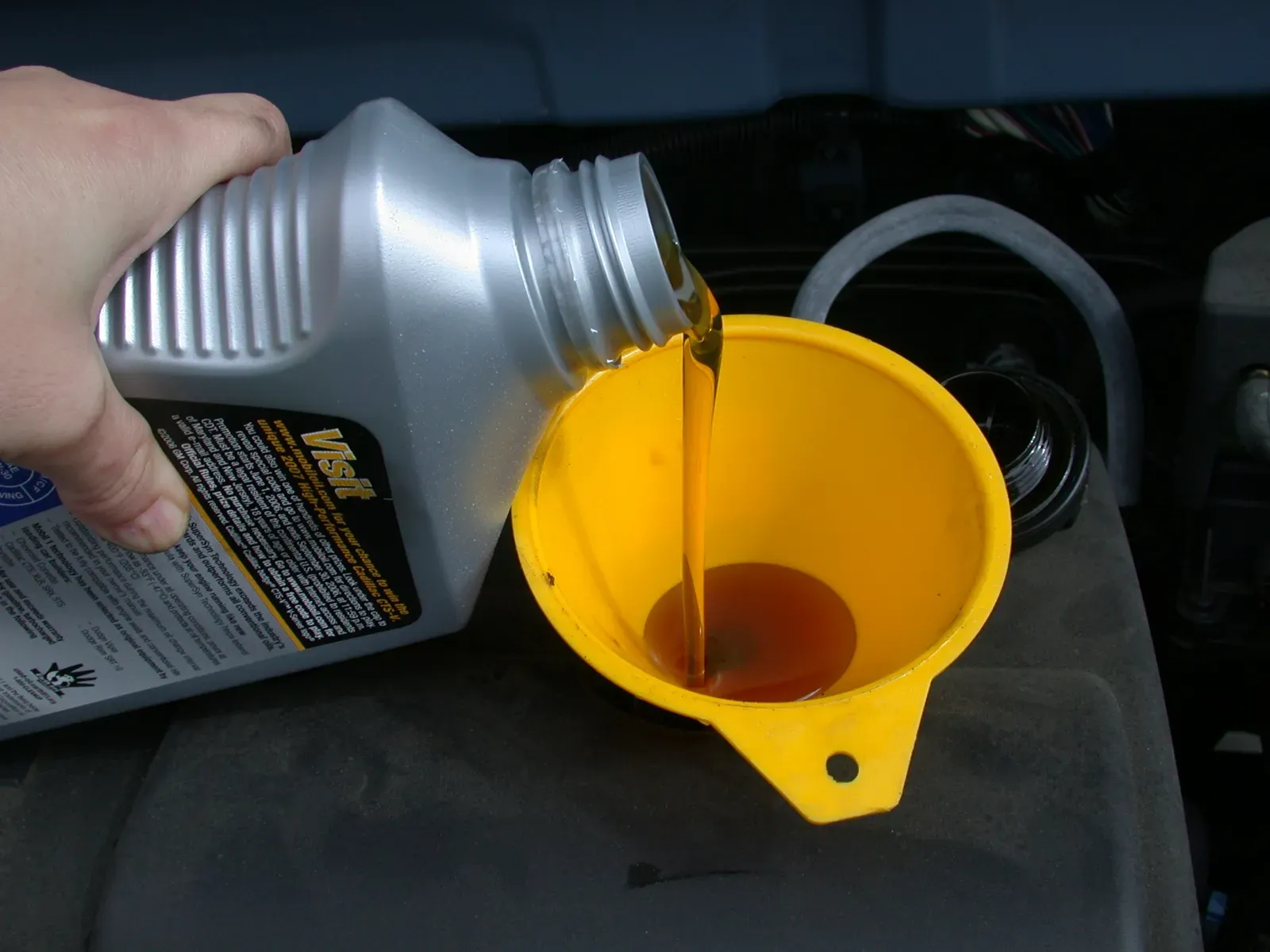 Topping Off or Changing Fluids (Image Credits: Wikimedia)