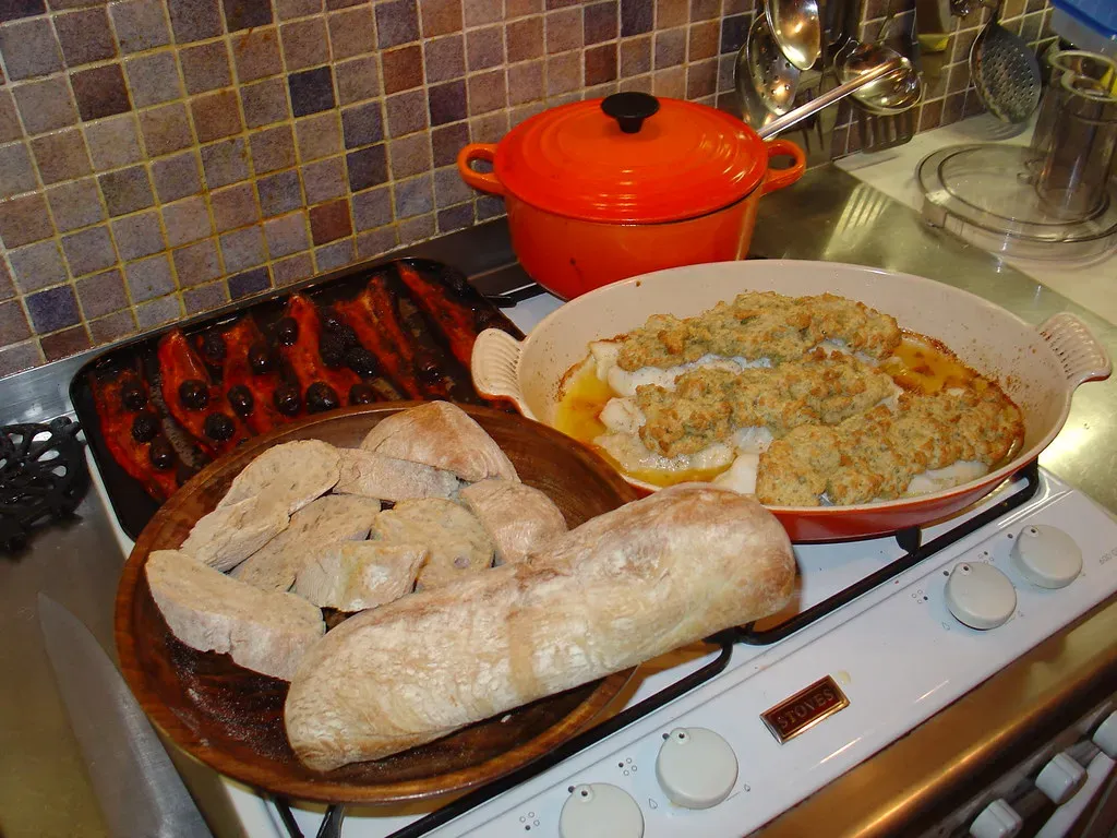 Pisces: Herb-Roasted Cod With White Bean Puree And Wilted Spinach (Image Credits: Flickr)