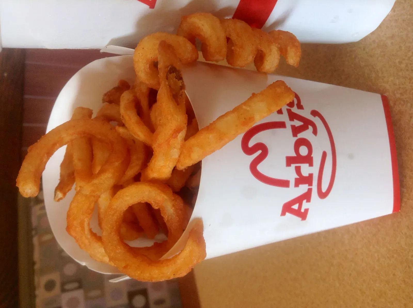 Arby's Curly Fries: Spiraled Perfection (Image Credits: Wikimedia)