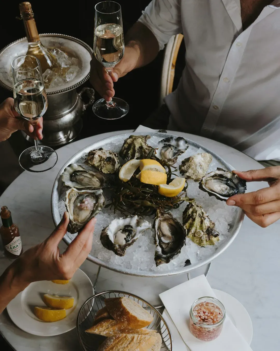 Oysters and Champagne (Image Credits: Unsplash)