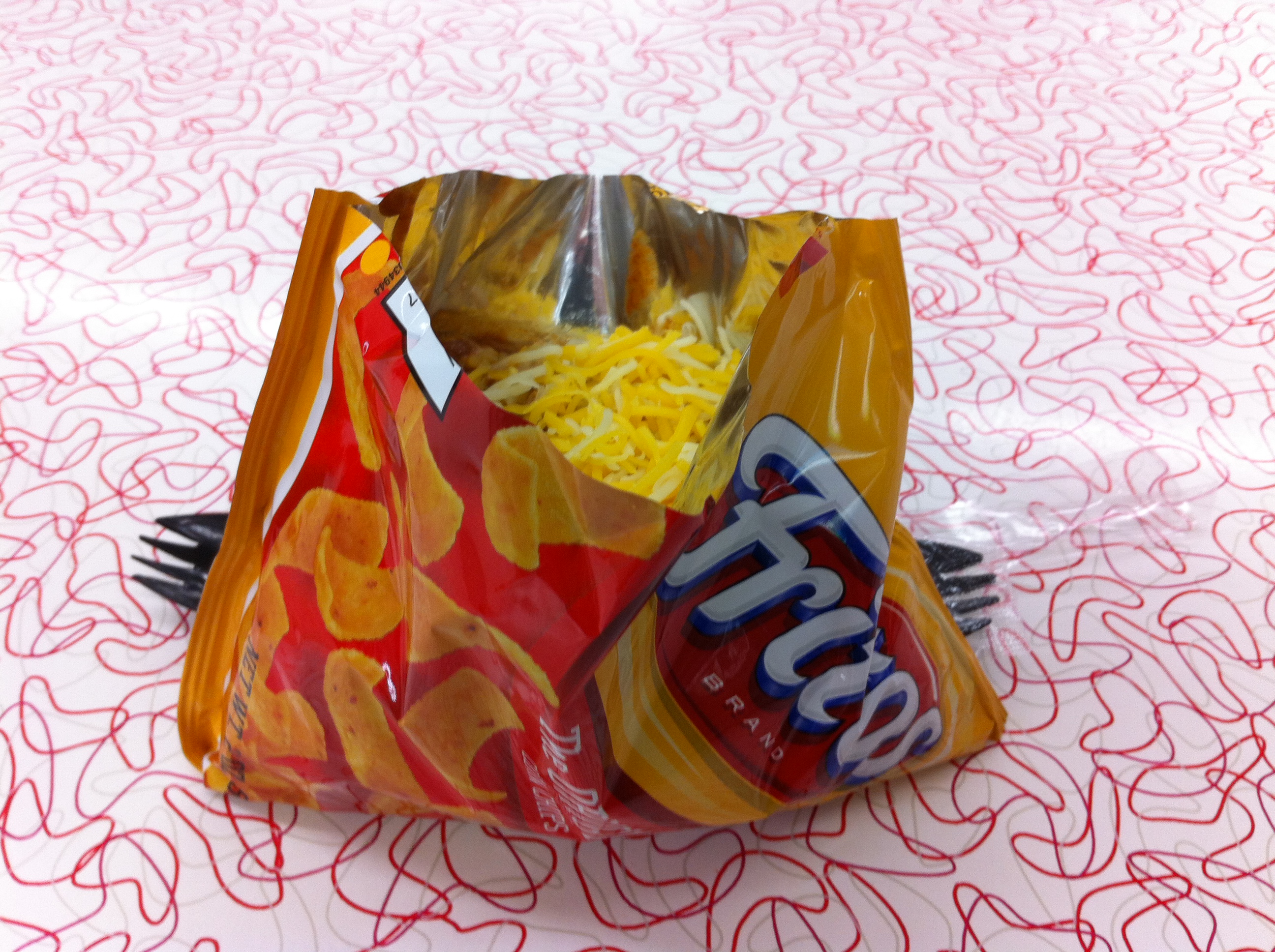 New Mexico Frito Pie - Christmas Colors on a Bag of Chips (image credits: By Leonard J. DeFrancisci, CC BY-SA 3.0, https://commons.wikimedia.org/w/index.php?curid=23331232)