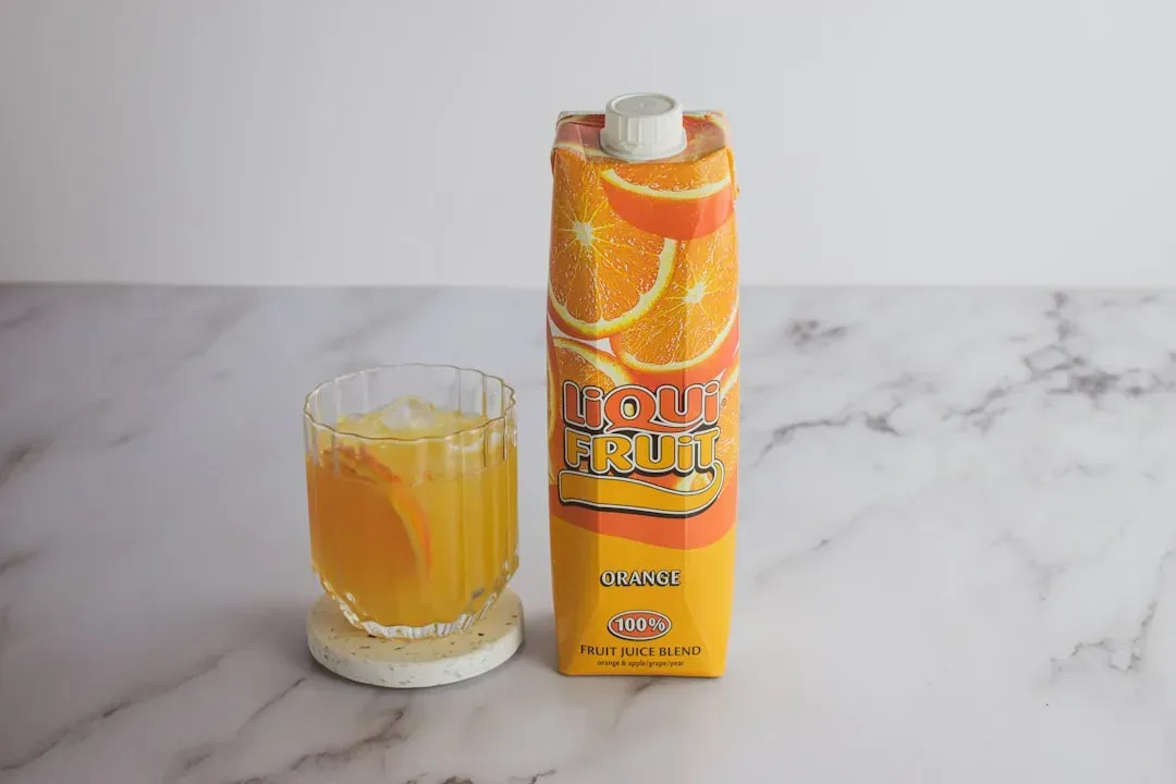 4. Orange Juice: The Carton Quietly Losing a Full Glass (Image Credits: Unsplash)