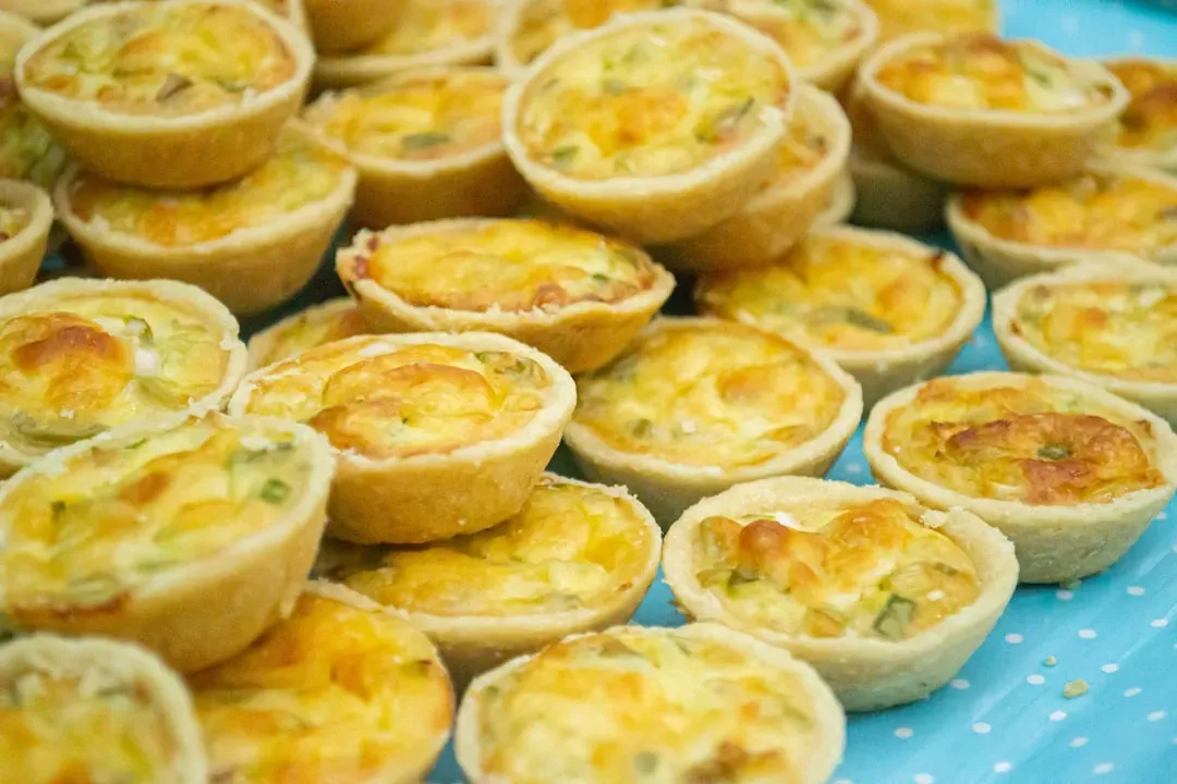 5. Miniature Quiches - The Frozen Aisle Dressed in Party Clothes (Image Credits: Unsplash)
