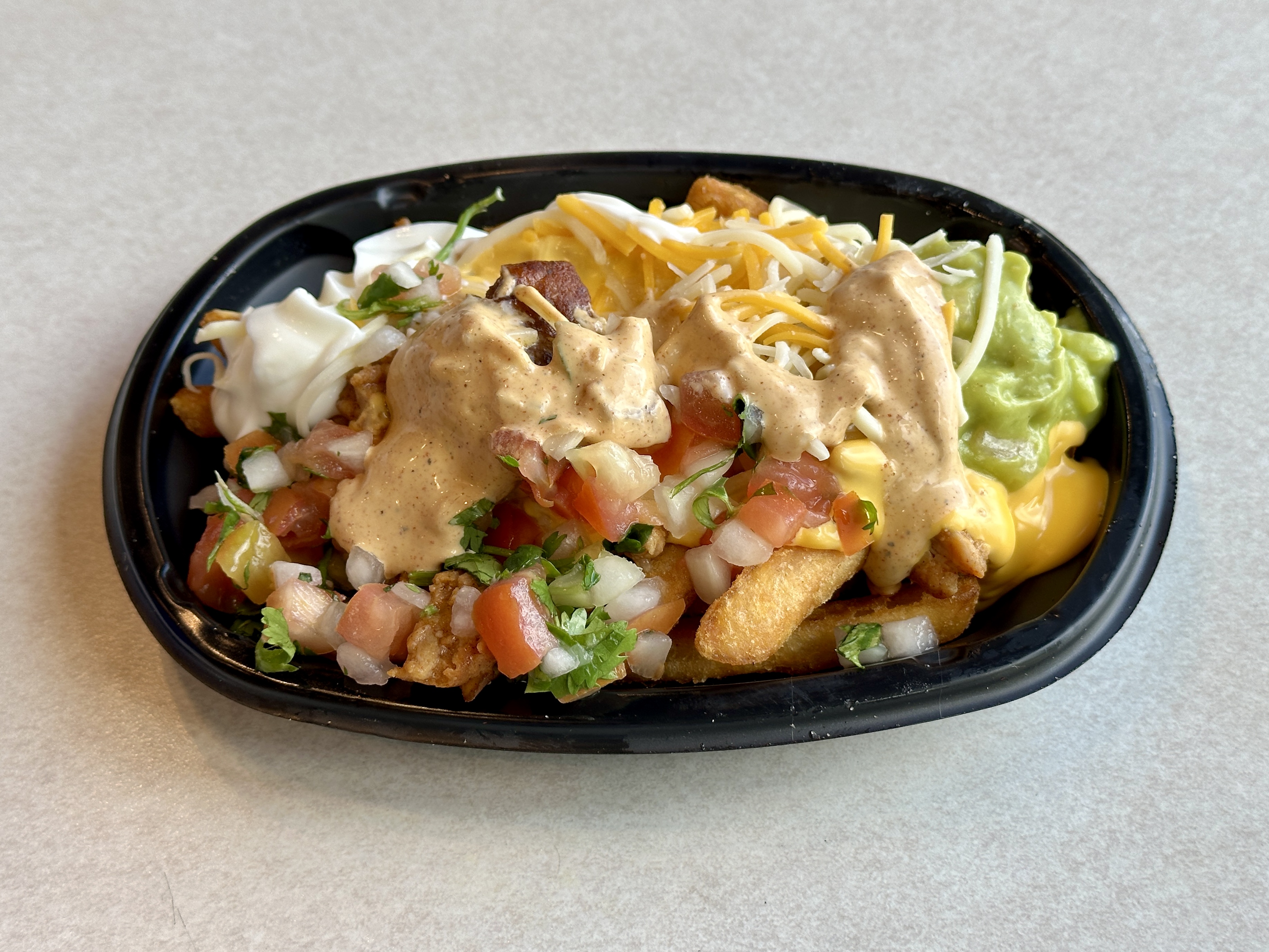 Taco Bell's Limited-Time Experiment (image credits: Secret Aardvark Nacho Fries Taco Bell, CC BY 2.0, https://commons.wikimedia.org/w/index.php?curid=148975808)
