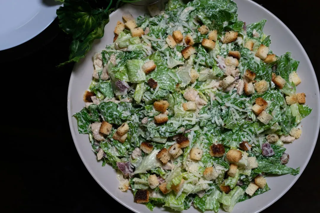 6. Caesar Salad as the Mandatory Dinner Party Starter (Image Credits: Unsplash)