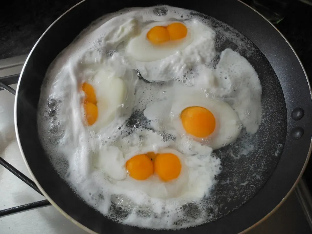 4. Undercooked Eggs and Egg-Based Dishes (Image Credits: Unsplash)