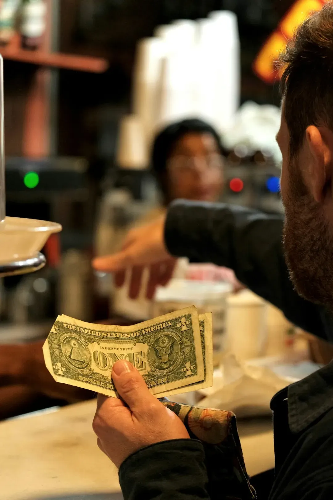 Leaving Pocket Change on the Table at a Full-Service Restaurant (Image Credits: Unsplash)