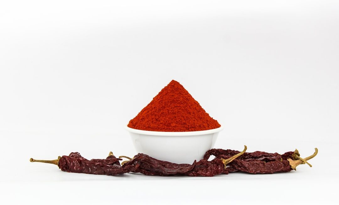 Using Stale or Low-Quality Chili Powder (Image Credits: Unsplash)