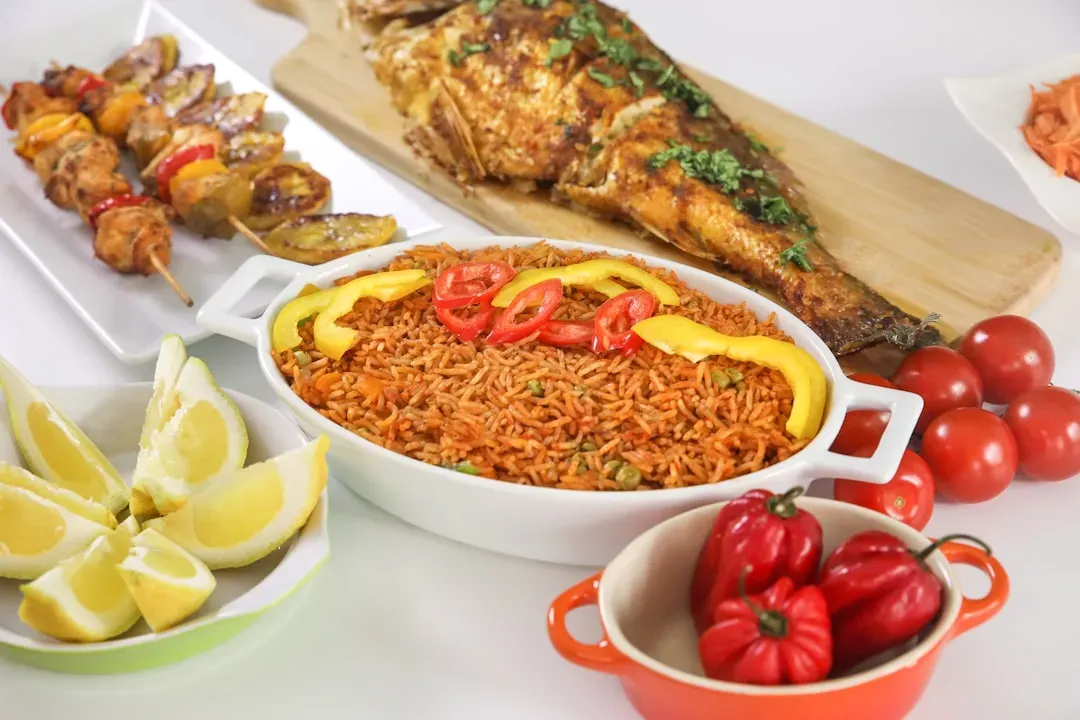 West African Jollof Rice with Plantain and Grilled Chicken (Image Credits: Unsplash)