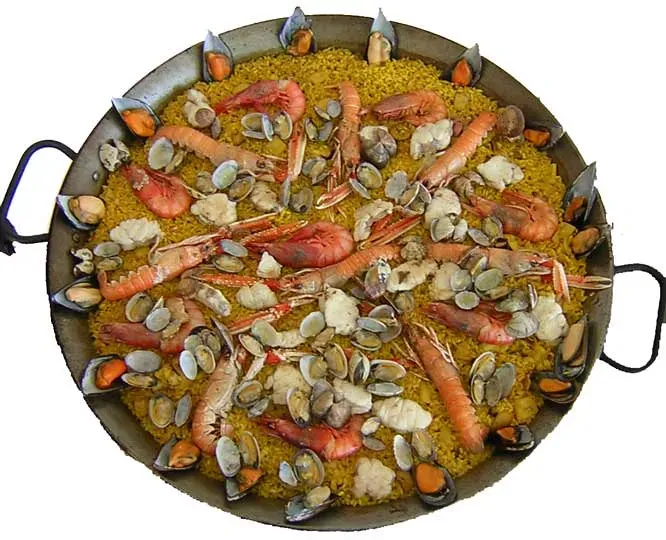 Paella: Coordinating Seafood, Meat, and That Perfect Socarrat (Image Credits: Flickr)