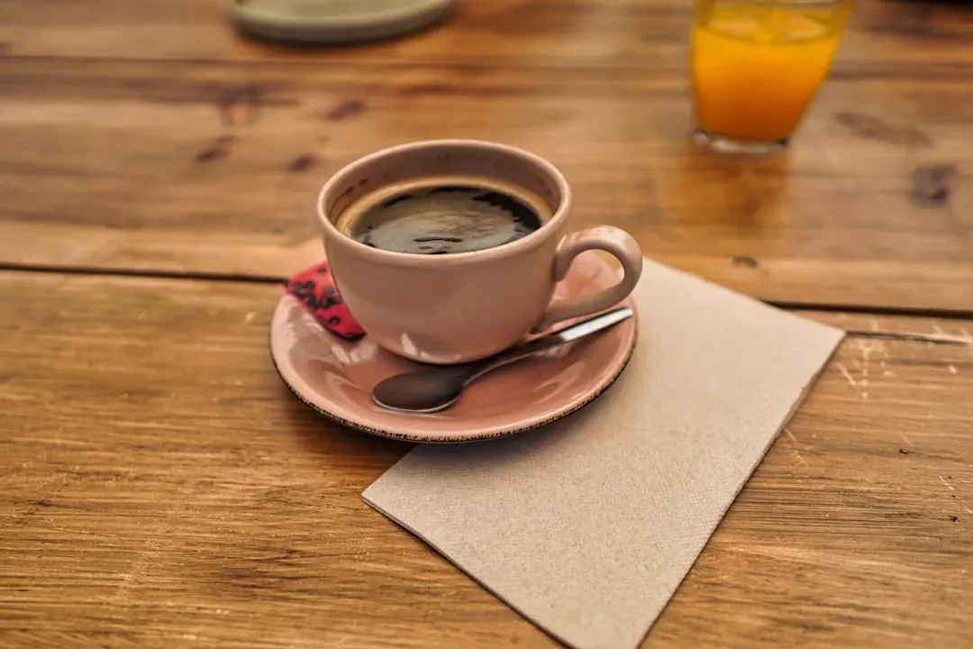 Coffee and Orange Juice (Image Credits: Unsplash)