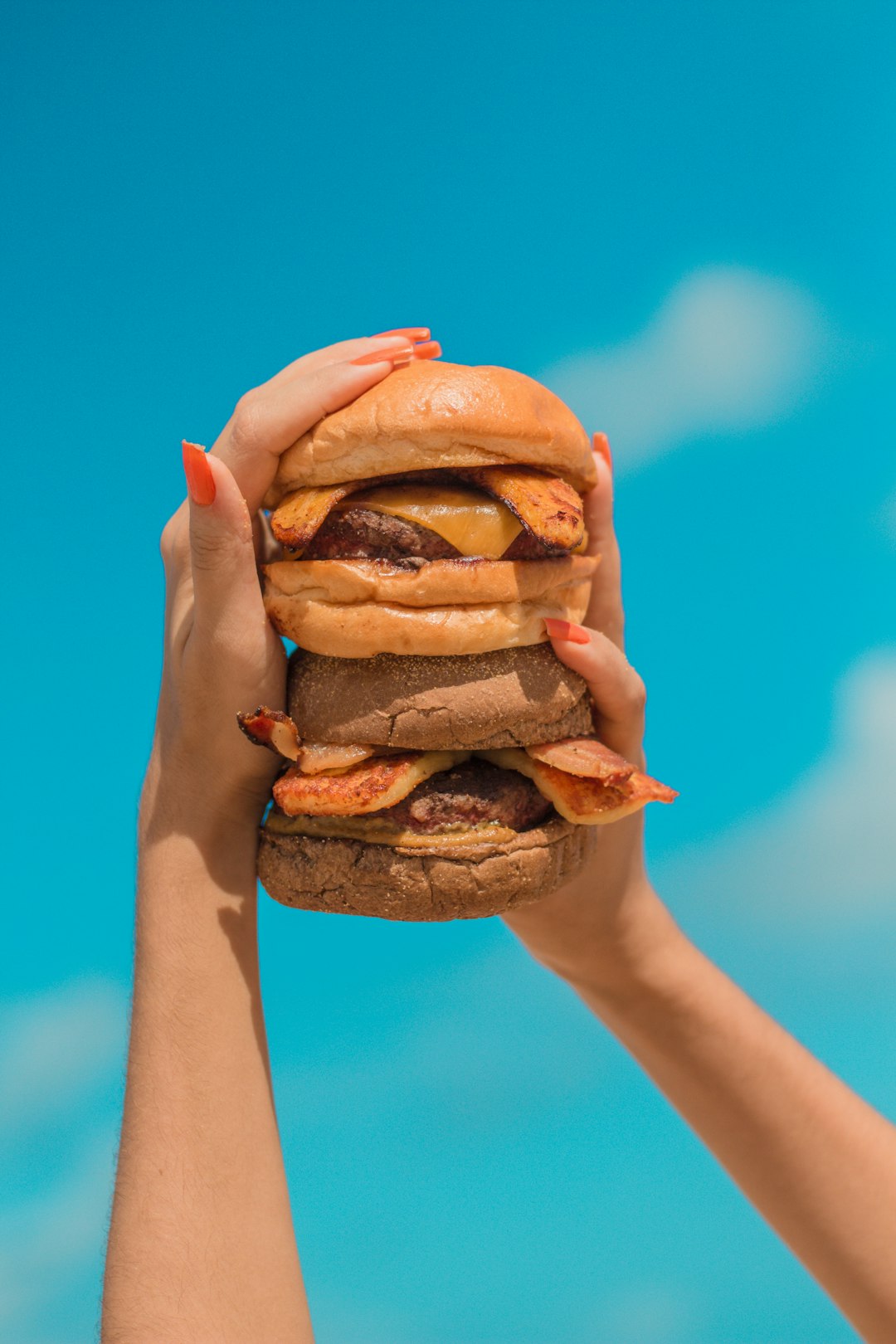 Towering Burgers Are More Instagram Prop Than Meal (image credits: unsplash)