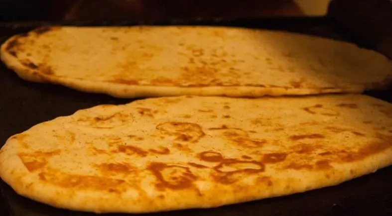 Chicken Tikka Masala with Naan (Image Credits: Flickr)