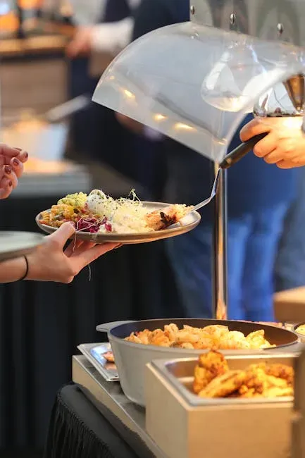 5. Eating Directly From the Serving Trays While Standing in Line (Image Credits: Pexels)