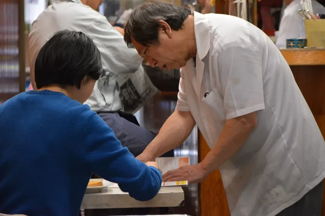 6. Debating Menu Prices With Staff (Image Credits: Unsplash)