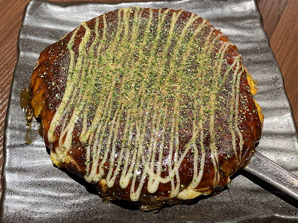 Okonomiyaki: A Savory Pancake Delight (image credits: wikimedia)